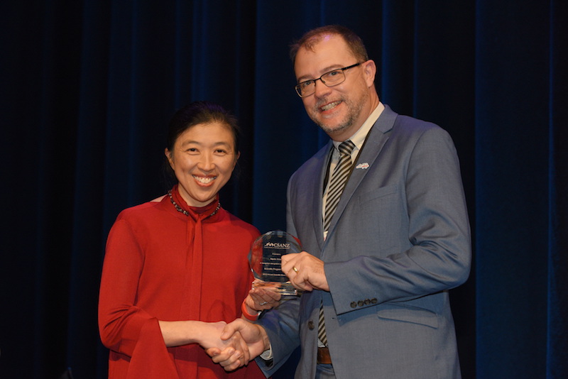 Dr Stiles receiving a plaque acknowledging his Scientific Programme leadership at CSANZ2022